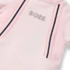 Babypyjamas i sammet med logotryck