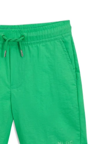 Badshorts för barn med logotryck