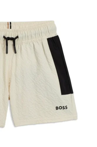 Badshorts för barn med logotryck i seersucker