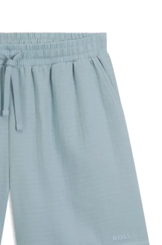 Badshorts i bomullsmuslin