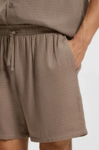 Badshorts i bomullsmuslin