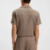 Badshorts i bomullsmuslin