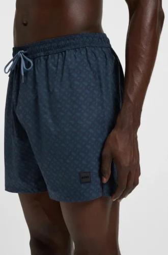 Badshorts med logotyp och monogramtryck i dégradé