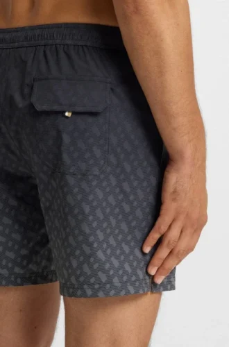 Badshorts med logotyp och monogramtryck i dégradé
