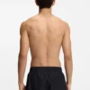 Badshorts med metalliskt delat logo