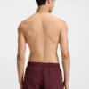 Badshorts med vertikalt logotryck