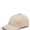 Barnkepsar i twill med broderad logotyp