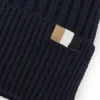 Barnmössa med broderad logotyp