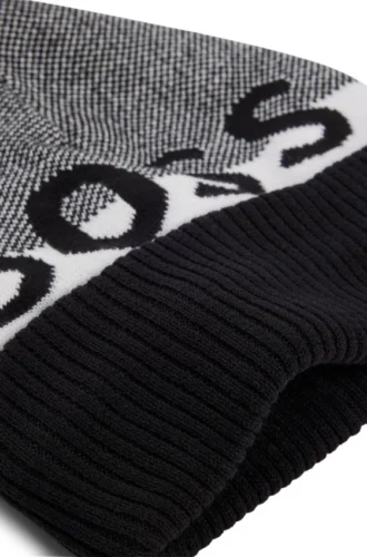 Barnmössa med pompom och jacquardvävd logotyp