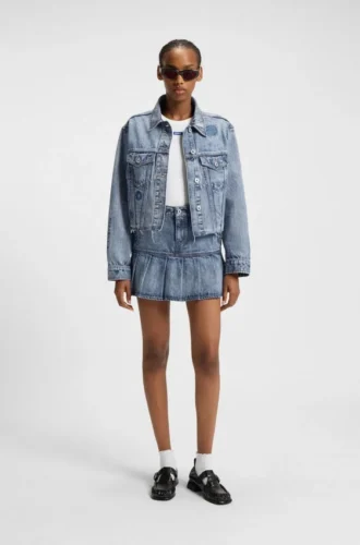Blå minikjol i styv denim med halvplissering