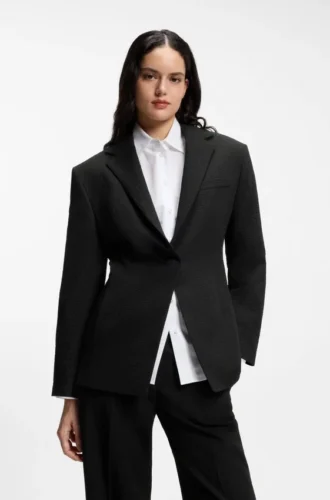 Blazer i seersucker med kedjebälte och avslappnad passform