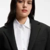 Blazer i seersucker med kedjebälte och avslappnad passform Blazer i seersucker med kedjebälte och avslappnad passform
