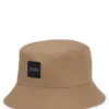 Bucket hat för barn med gummilogotyp i bomullstwill Bucket hat för barn med gummilogotyp i bomullstwill