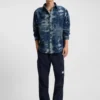 Byxor i avslappnad passform i ripstop med denimlook