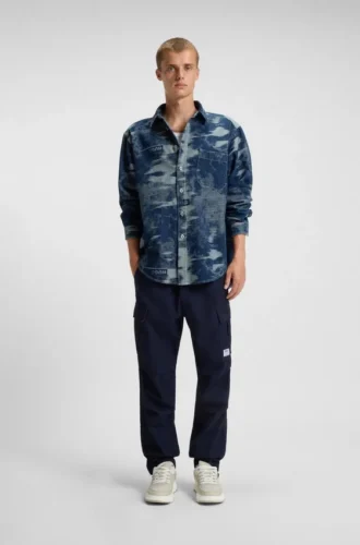 Byxor i avslappnad passform i ripstop med denimlook