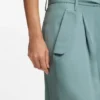 Byxor med avslappnad passform i draperat twill