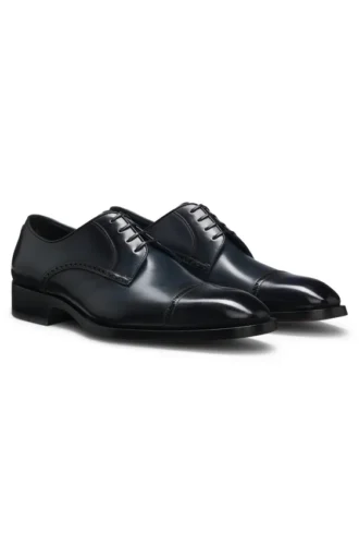 Derbyskor i läder med brogue-detaljer