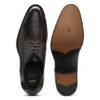 Derbyskor i läder med brogue-detaljer