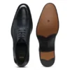 Derbyskor i läder med brogue-detaljer