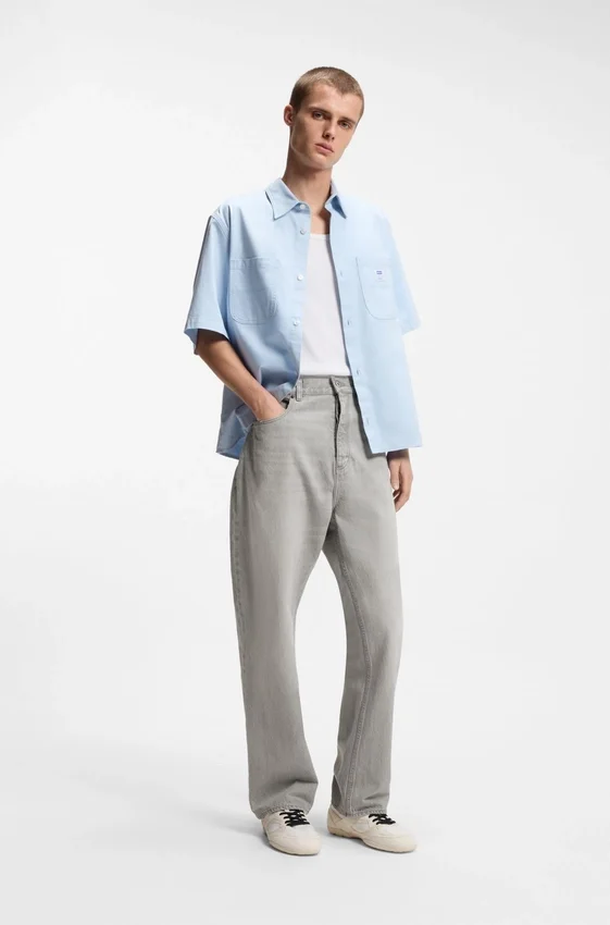 Gråa baggy-passformade jeans i stonewashed denim Gråa baggy-passformade jeans i stonewashed denim