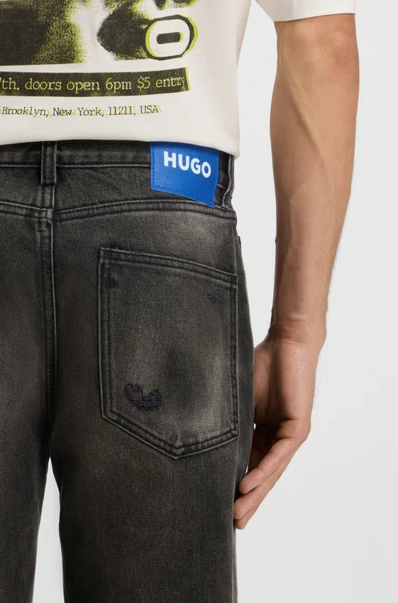Gråa jeans i normal passform i slitna denim Gråa jeans i normal passform i slitna denim