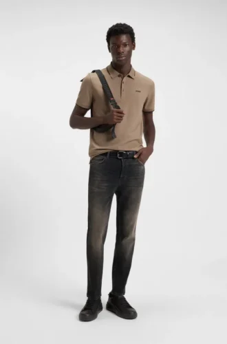 Gråa jeans med avsmalnande passform i stretchdenim