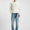 Grönaktiga jeans med avsmalnande passform i stretchdenim Grönaktiga jeans med avsmalnande passform i stretchdenim