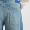 Grönaktiga jeans med avsmalnande passform i stretchdenim Grönaktiga jeans med avsmalnande passform i stretchdenim