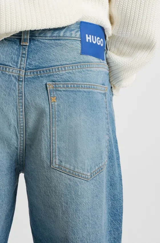 Grönaktiga jeans med avsmalnande passform i stretchdenim Grönaktiga jeans med avsmalnande passform i stretchdenim