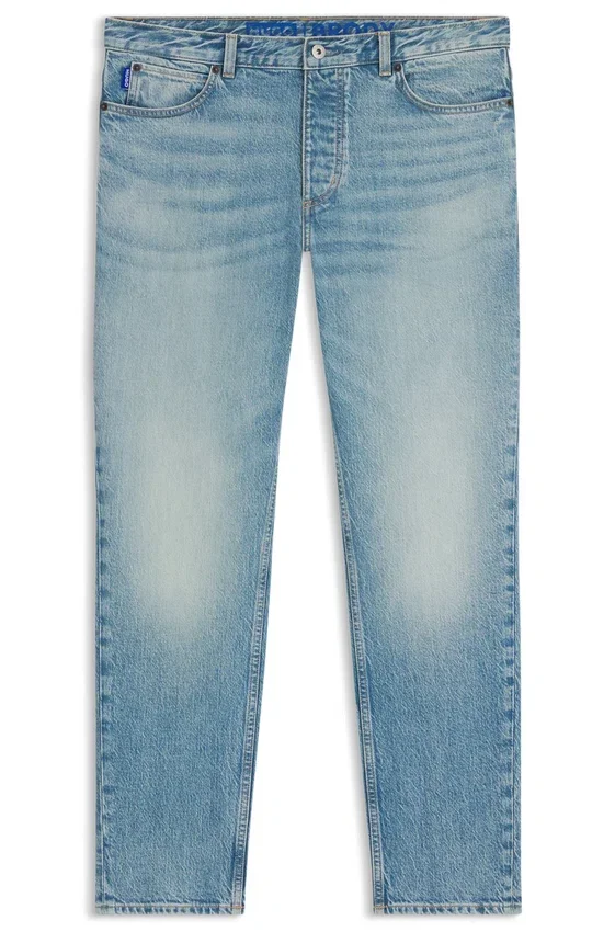 Grönaktiga jeans med avsmalnande passform i stretchdenim Grönaktiga jeans med avsmalnande passform i stretchdenim