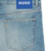 Grönaktiga jeans med avsmalnande passform i stretchdenim Grönaktiga jeans med avsmalnande passform i stretchdenim