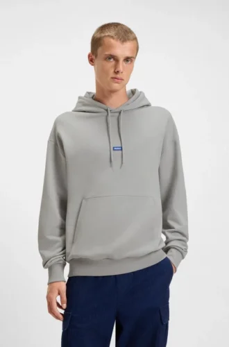 Huvtröja i bomullsfrotté med blå logotyp
