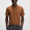 Italienskt läderbälte med spänne med ingraverad logotyp