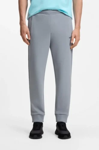 Joggingbyxor i bomullsblandning med broderat logo