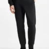 Joggingbyxor i bomullsblandning med broderat logo