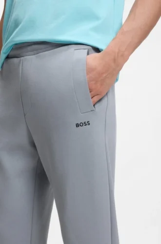 Joggingbyxor i bomullsblandning med broderat logo