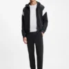 Joggingbyxor i bomullsblandning med broderat logo