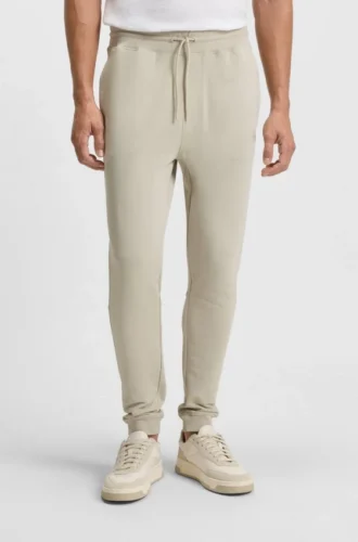 Joggingbyxor i bomullsfrotté med logotyp