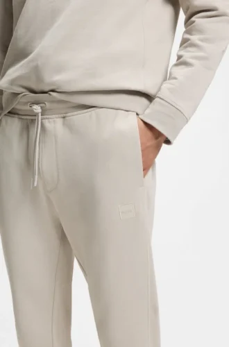 Joggingbyxor i bomullsfrotté med logotyp