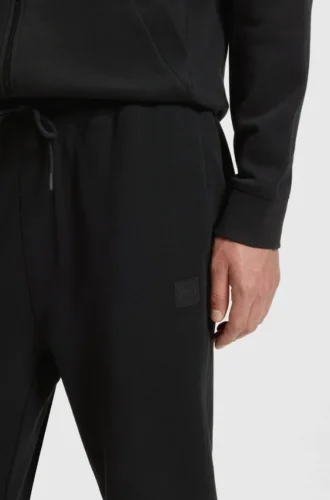 Joggingbyxor i bomullsfrotté med logotyp