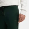 Joggingbyxor med muddar i bomullsfrotté med logotryck