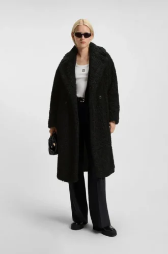 Kappa i fuskpäls med oversized-passform
