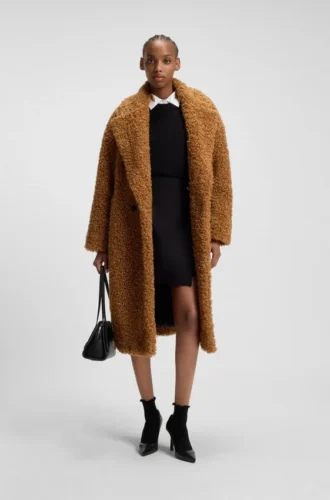 Kappa i fuskpäls med oversized-passform