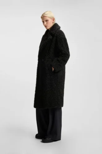 Kappa i fuskpäls med oversized-passform
