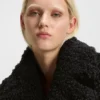 Kappa i fuskpäls med oversized-passform