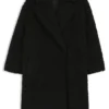 Kappa i fuskpäls med oversized-passform