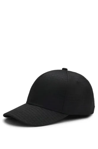 Kepsar med jacquardmönster med logotyp över hela ytan