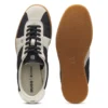 Låga sneakers med detaljer i mocka