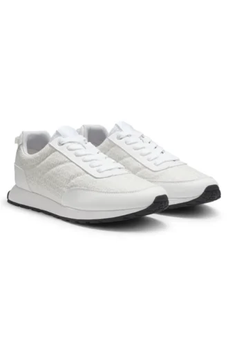 Låga sneakers med monogram på ovansidan