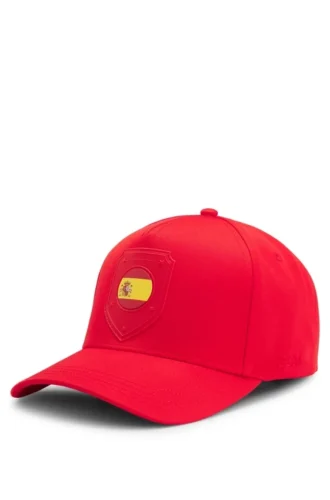 Logokepsar i glansig twill med landsflagga Logokepsar i glansig twill med landsflagga